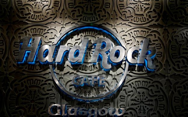 Detailed view of the iconic wall at Hard Rock Café Glasgow, showcasing its rock 'n' roll legacy and vibrant atmosphere.